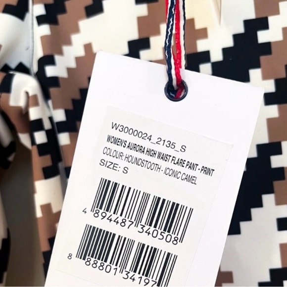 Perfect moment Aurora Flare Pant in Iconic Camel, Black, & White Houndstooth - Picture 9 of 10